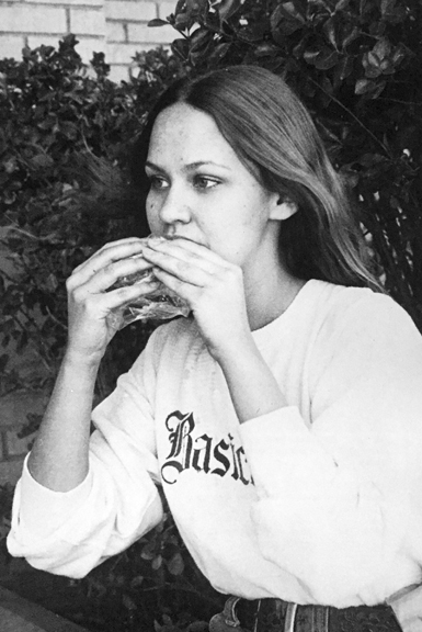 PEACEFULNESS... of a quiet lunch outdoors is enjoyed by Doreen Snyder who brown bags it, skipping the fast food pitstops.