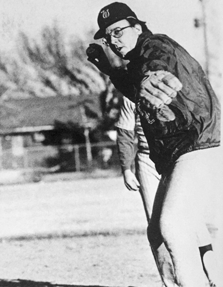 Coach Darr"IT'S ALL IN THE WRIST!" Coach Darrel Palmer instructs his prize pitching staff.l Palmer