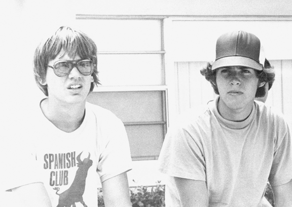 Mark Nash and Danny Morgan catch the action out on the patio during a Spanish club meeting.