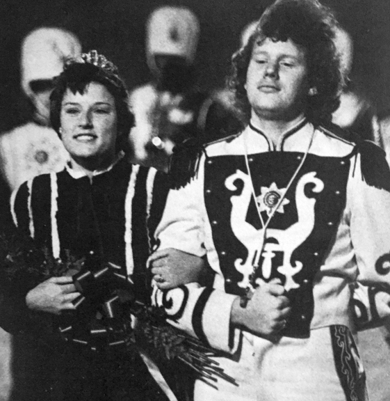 HIGHLIGHT... of the band's halftime show at the Edmond football game was the crowning of Queen Paula Holleman, escorted by drum major Roger Nunn.