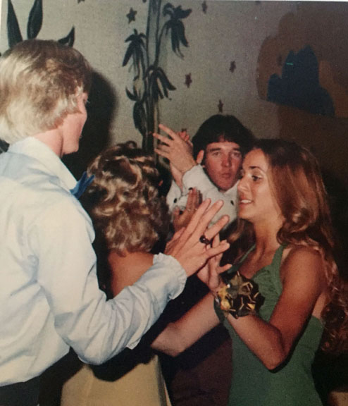 GLITTER AND GLAMOUR... Jeff Purdum and Tina Held are among the 400 couples attending the '76 prom at the Ramada Inn.