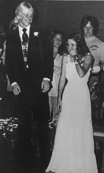 THRILL OF A LIFETIMME... A surprise announcement catches All-Sports Queen, Cathie McCain and her escort, Jeff Purdum, off-guard.